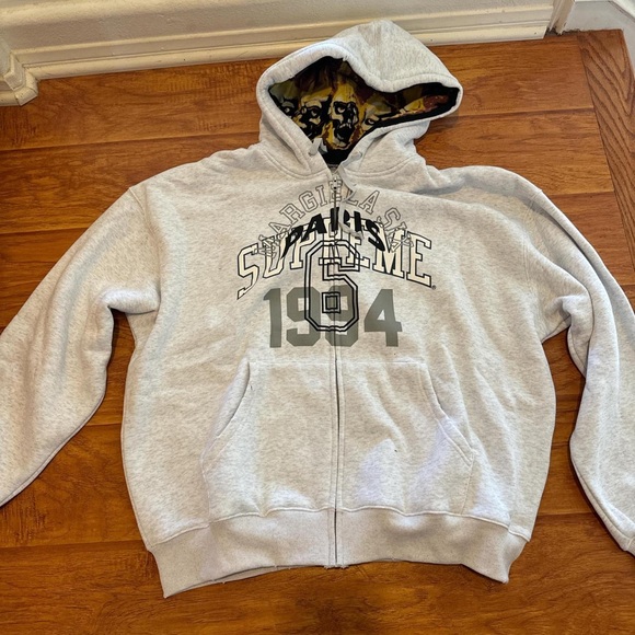 Supreme Light Gray Hoodie with Black and Gold Design